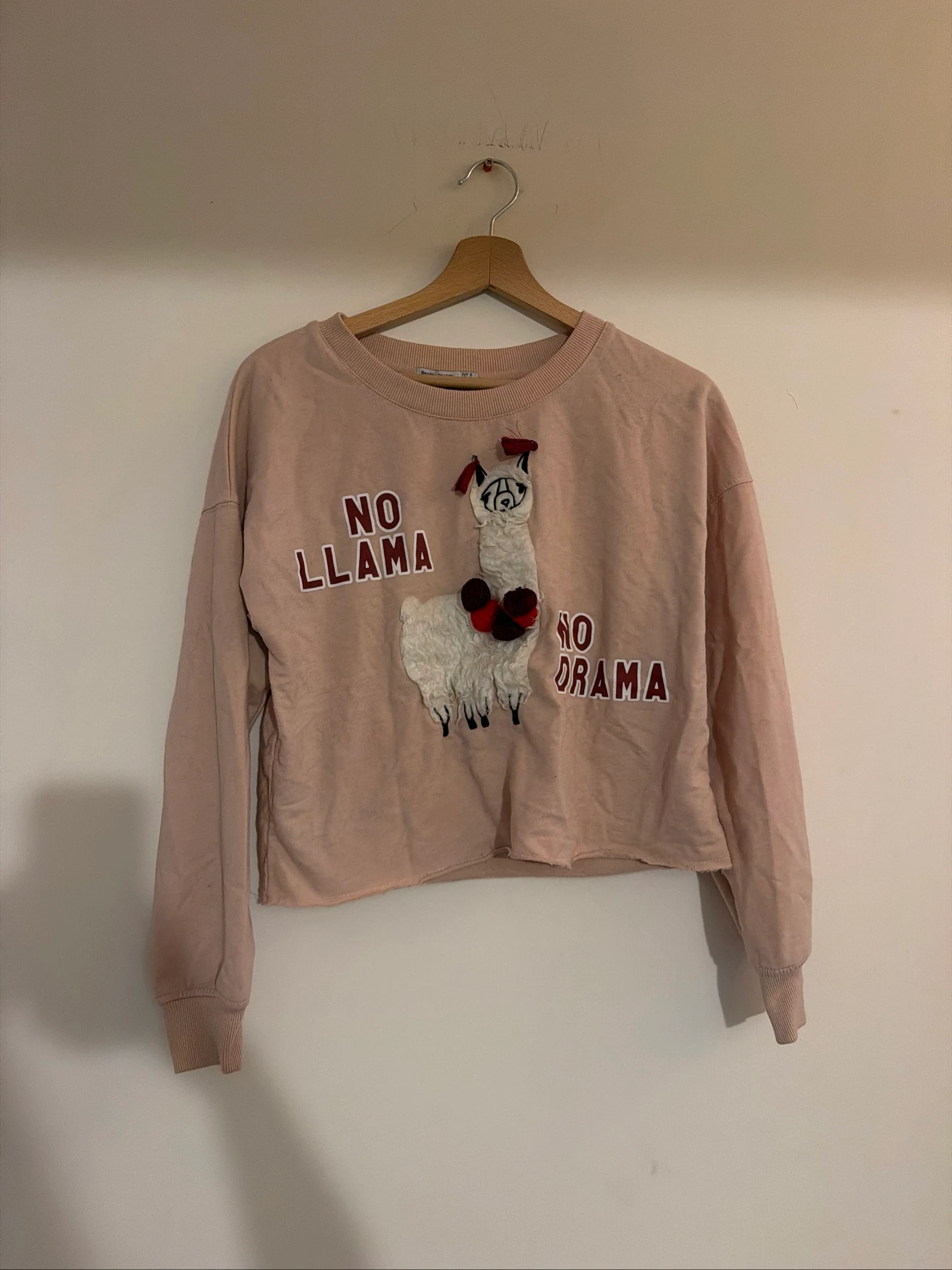 Pull rose clair lama bershka taille S correct 